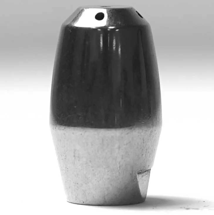 A close-up of the W.5088 STAINLESS STEEL SPHERA STEAM STEM TIP, a metallic cylindrical piece with a shiny dark upper section, matte lighter lower half, top hole, and base groove, shown upright on a light surface. © 2025 1st-line.com