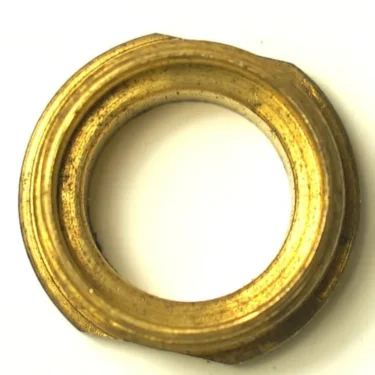 A close-up photo shows the DISCONTINUED S...80 3/8 NUT, made of brass with a central circular opening and slight tarnish, viewed from above on a white background. © 2025 1st-line.com