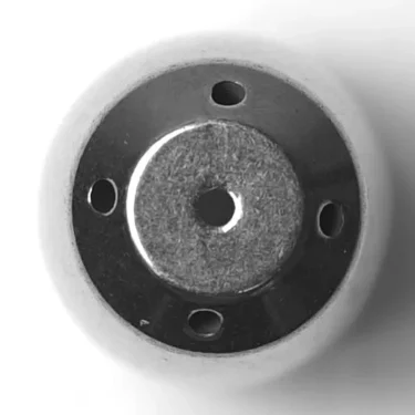 A close-up, top-down view of the W.5088 STAINLESS STEEL SPHERA STEAM STEM TIP shows a white wheel with a stainless steel center, featuring a central hole and three smaller mounting holes. © 2025 1st-line.com