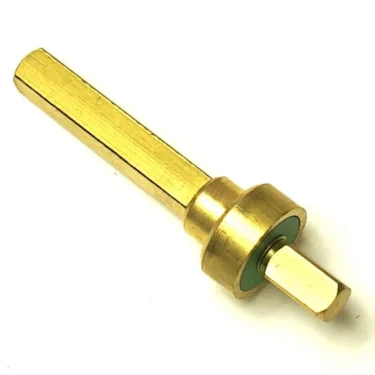 A gold-colored metal hex shank adapter with a cylindrical base, used for attaching tools to a drill, and offering build quality comparable to the VBM303 COMPLETE INFUSION VALVE. © 2025 1st-line.com