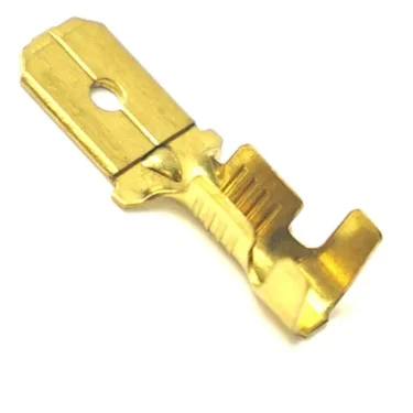 A gold-colored V..559 MALE FAXTON TERMINAL featuring a flat base, round hole near one end, and a shaped wire attachment point. © 2025 1st-line.com