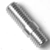 A metallic double-ended stud bolt with a hex center is shown next to a DISCONTINUED R....3 COPPER GASKET 22x17x1.5mm on a white background. © 2025 1st-line.com