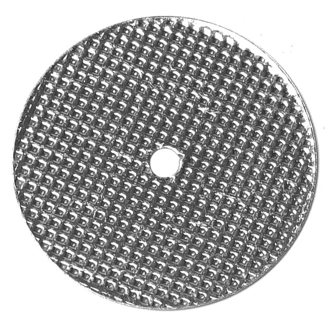A SAE..5 PORTAFILTER RUBBER GASKET 67x46x5mm is shown on a plain white background. The round, flat gasket is silver with a small center hole and a textured, grid-like surface. © 2025 1st-line.com