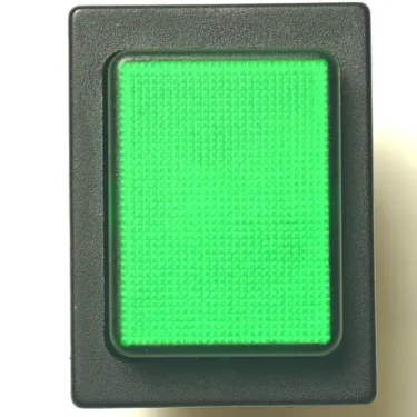 A top view of the SAM.40 BLACK PUSH-BUTTON—a rectangular green-black button housed in a black plastic casing—set against a light background. © 2025 1st-line.com
