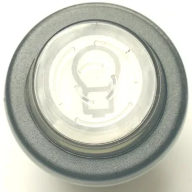 A top view of the V.4246 25mm WATER PUSH-BUTTON, round and gray with a transparent center featuring a light bulb icon. © 2025 1st-line.com