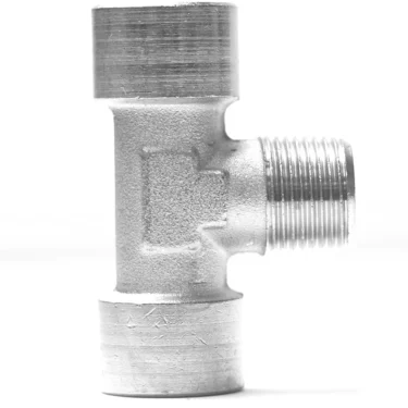 A V.1865 3/8Fx3/8Mx3/8F T FITTING with threaded ends is shown on a white background, its central connector facing right to display the visible threading. © 2025 1st-line.com