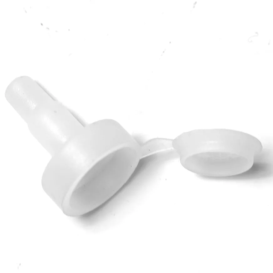 A white plastic cap with an attached hinged cover, designed to fit the V..829 FILTERs small cylindrical nozzle. Shown on a plain white background. © 2025 1st-line.com