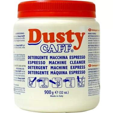 A white plastic container of Dusty Caff Group Cleaner Backflush Detergent 900g with a red lid features multilingual text and brewing icons on the label. Made in Italy, this group cleaner comes in a 900g (32 oz) size. © 2025 1st-line.com