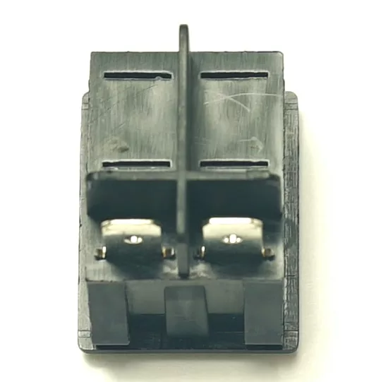 Close-up of a black plastic electrical connector with two metal terminals for the V.4308 WHITE INDICATOR LIGHT 230V, photographed on a white background. © 2025 1st-line.com
