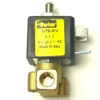 Close-up of a Parker solenoid valve with a yellow label showing model N79.61V, 1.2 mm, 0–14 bar AC, “Made in Italy,” and V.1696 600mm TOUCHPAD RIBBON WIRING attached to the black and brass housing with metal connectors. © 2025 1st-line.com