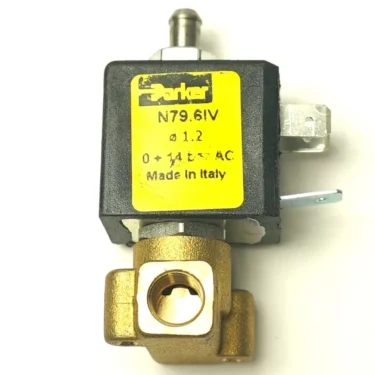 Close-up of a Parker solenoid valve with a yellow label showing model N79.61V, 1.2 mm, 0–14 bar AC, “Made in Italy,” and V.1696 600mm TOUCHPAD RIBBON WIRING attached to the black and brass housing with metal connectors. © 2025 1st-line.com