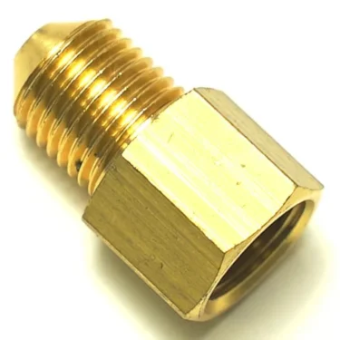 Close-up of a V.1860 1/4Mx1/4F FITTING, featuring a threaded end and hexagonal nut, designed for connecting pipes or hoses in plumbing or automotive uses. © 2025 1st-line.com
