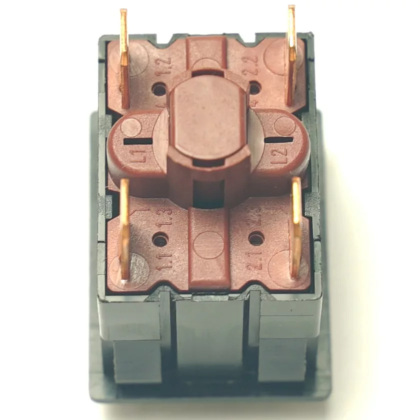 Close-up of a V.4289 BLACK PUSH SWITCH electrical rocker switch in black and brown, featuring six copper terminals on top, isolated on a white background. © 2025 1st-line.com