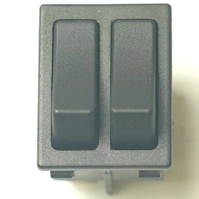 Close-up of a V.4387 DOUBLE ROCKER SWITCH - ORANGE/ORANGE, featuring two separate orange buttons for electrical control, set against a plain light background. © 2025 1st-line.com