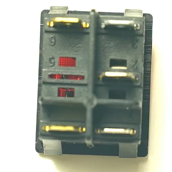 Close-up of the Ascaso V.1488 ORANGE LAMP SWITCH, featuring six gold-plated connectors and two red indicators against a light background—an essential component for Ascaso machines. © 2025 1st-line.com