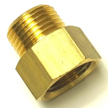 Close-up of the V.1423 1/2Mx1/2F FITTING, a pipe adapter with a hexagonal center, male threads on one end, and female threads on the other, shown against a white background. © 2025 1st-line.com