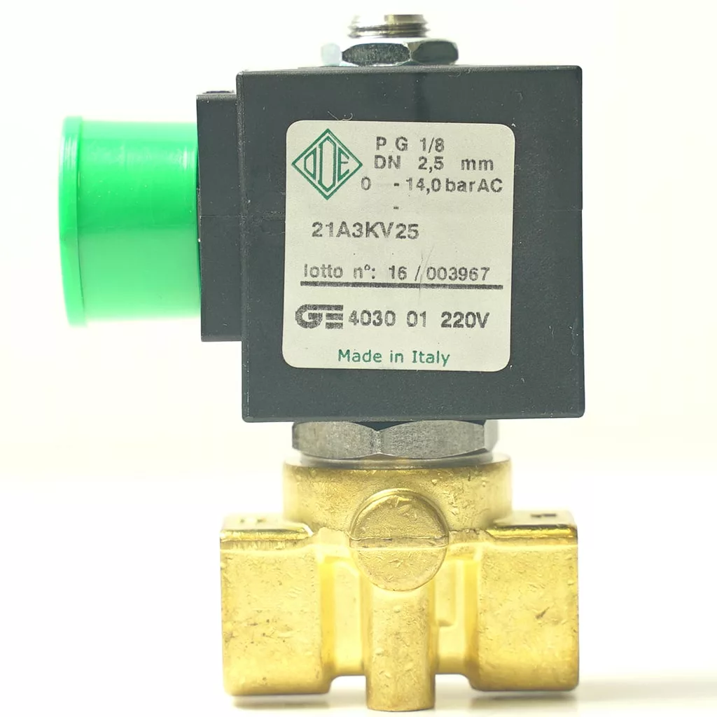 Close-up of the V.1465 230Vac 8W 1/8x1/8 ODE Solenoid, a 2-way valve with green cap and brass base. The label details model, specs, voltage, and origin (Italy). Ideal for controlling fluid or gas flow. © 2025 1st-line.com