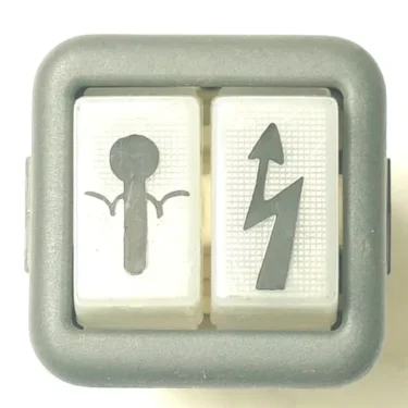 Close-up of the V.4423 DOUBLE PILOT switch in gray, featuring two white buttons: the left shows a mosquito icon, and the right displays a lightning bolt with an upward arrow. © 2025 1st-line.com