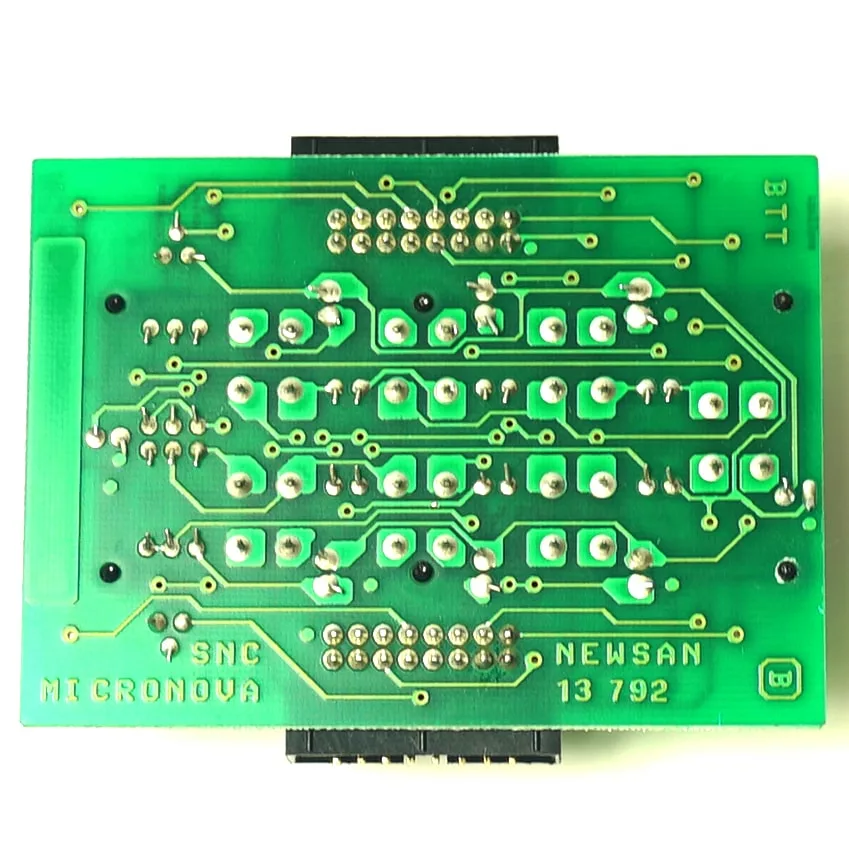 Green printed circuit board labeled MICRONOVA, NEWSAN, and 13 792 with visible solder points and traces. Features a black connector at the top edge and is identified as the SM.273 DOSING CIRCUIT. © 2025 1st-line.com