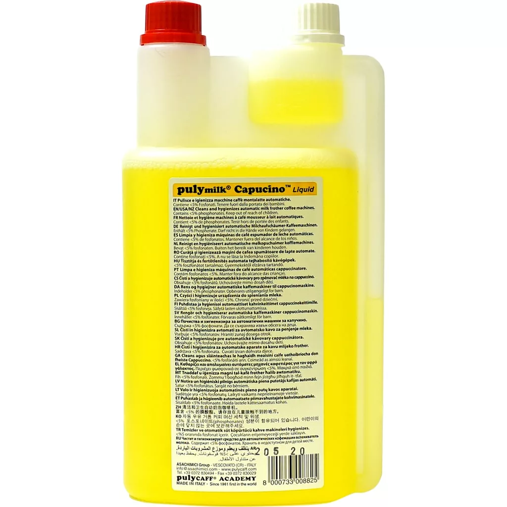 Puly Capucino Complete Detergent 1LT is a yellow liquid in a clear bottle with red and white caps and a front instruction label, ideal for keeping your coffee equipment clean. © 2025 1st-line.com