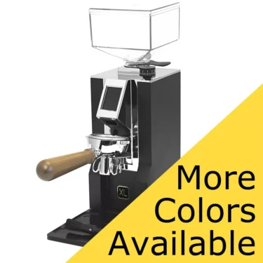 The Eureka Oro Mignon XL Espresso Coffee Grinder, shown in black with a wooden-handled portafilter and digital display on a white background, features a yellow overlay stating More Colors Available. © 2025 1st-line.com