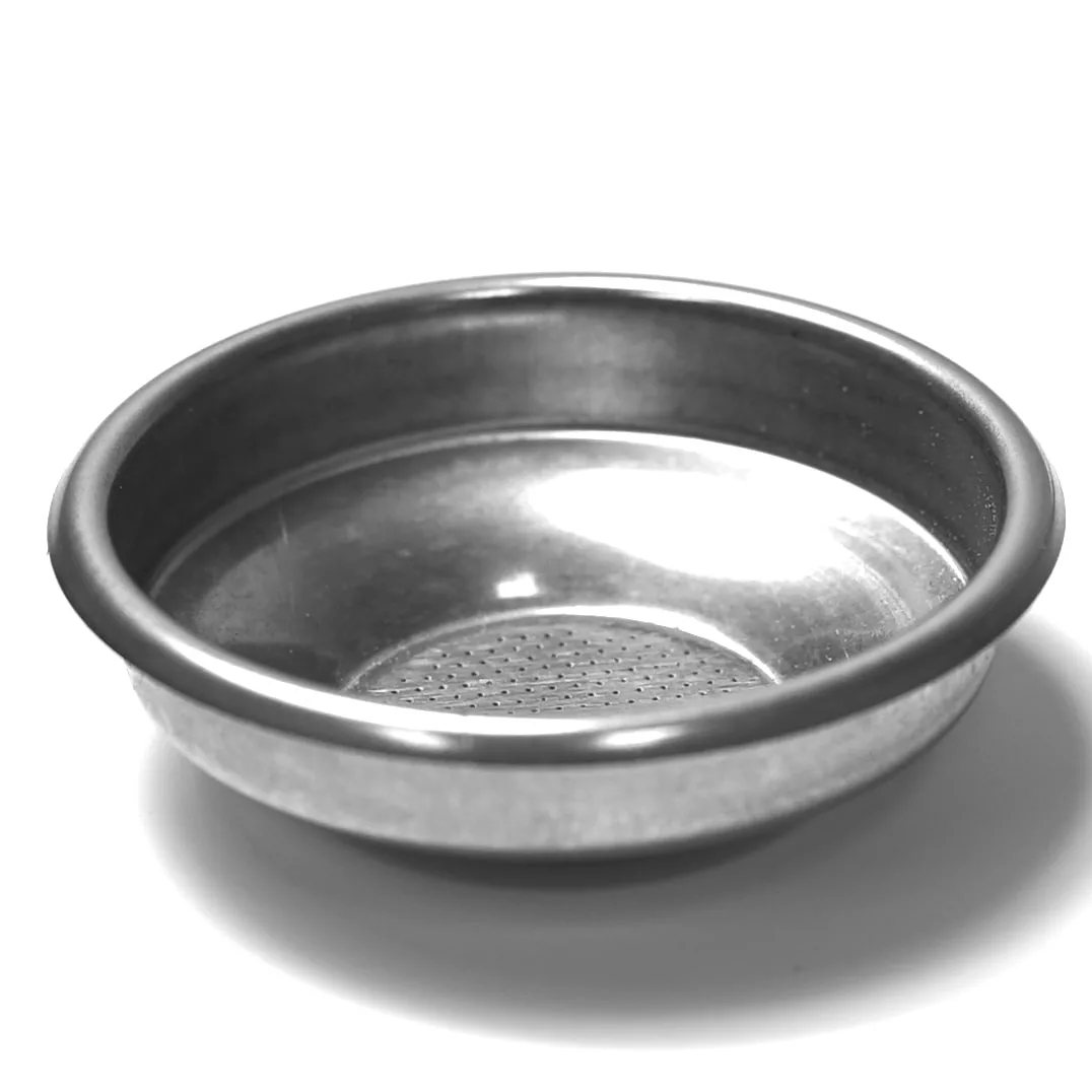 The M..198 1 CUP FILTER 7GRAMS is a round, shallow metal sieve with a fine perforated bottom, perfect for filtering 1 cup, shown on a white background. © 2025 1st-line.com