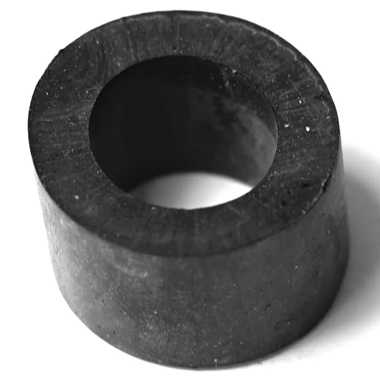 The R...94 FILTER HOLDER HANDLE is a cylindrical black ferrite ring magnet with a large central hole, typically used as a filter holder handle, shown on a white surface. © 2025 1st-line.com