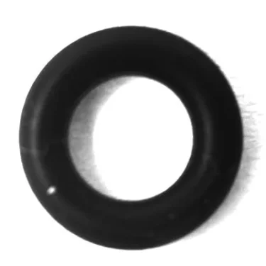 The S...28 TAP ROD O-RING, made of black rubber and designed for tap rod use, is displayed from above on a white background as a smooth, circular gasket with a central hole. © 2025 1st-line.com