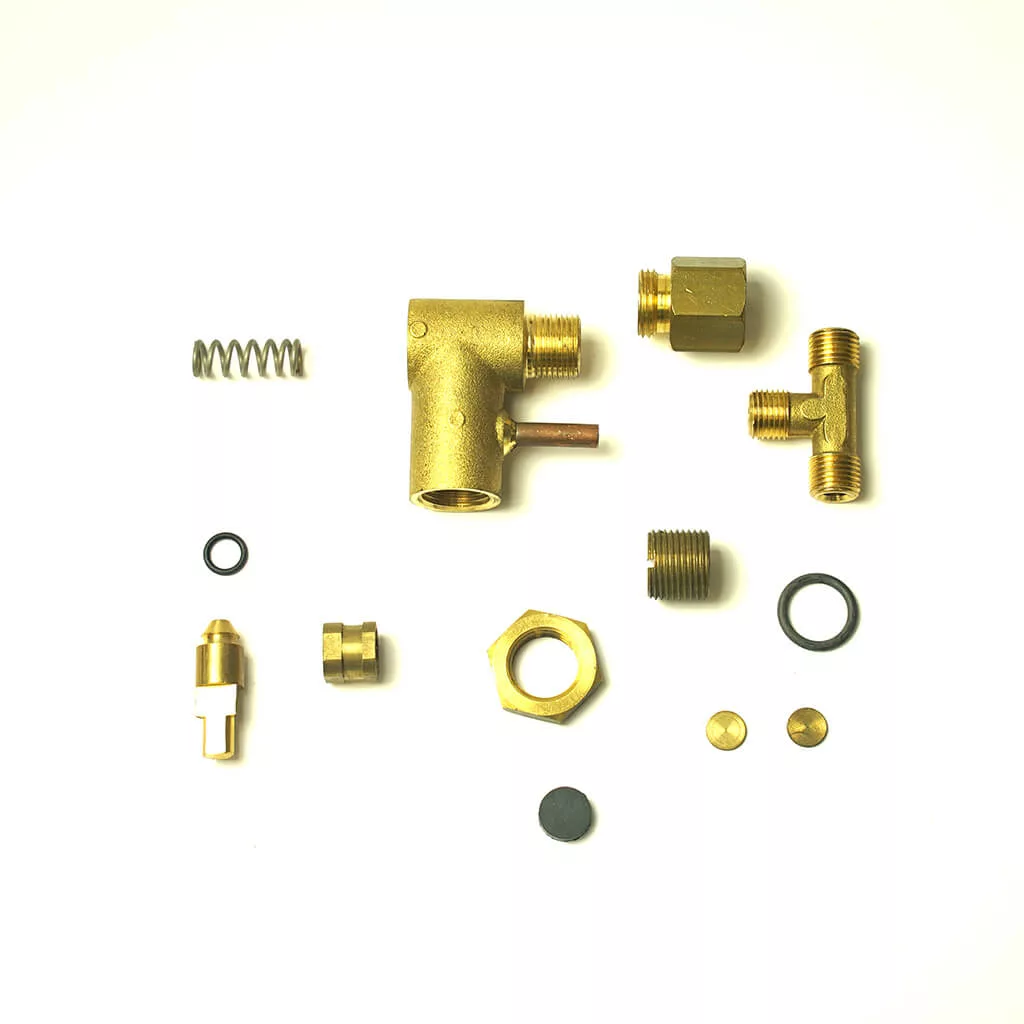 The SM.489 HANDLE and various brass and metal plumbing or mechanical components such as springs, fittings, nuts, washers, and small cylindrical parts are arranged neatly on a white background. © 2025 1st-line.com