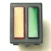 The V.4312 DOUBLE INDICATOR LIGHT - RED/GREEN features a rectangular black switch panel with two vertical, textured buttons: a red-green button on the left and a green button on the right, both slightly raised for easy use. © 2025 1st-line.com