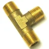 The V..899 1/4 T-FITTING is a brass connector with threaded ends, ideal for joining three pipes or tubes. © 2025 1st-line.com