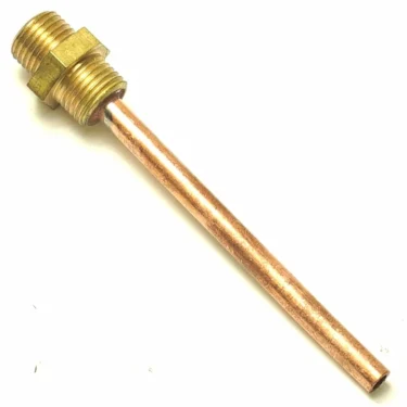 The W..604 GASKET PRESS features a brass and copper fitting with a threaded end, connected to a long, straight copper tube, isolated on a white background. © 2025 1st-line.com