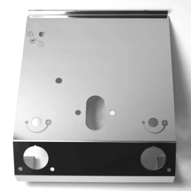 The VBM FRONDOMSMLVRV Front Body Panel is a shiny, metallic panel with circular holes, small engraved symbols, and indented areas, shown on a white background—suitable for electronic or mechanical devices. © 2025 1st-line.com