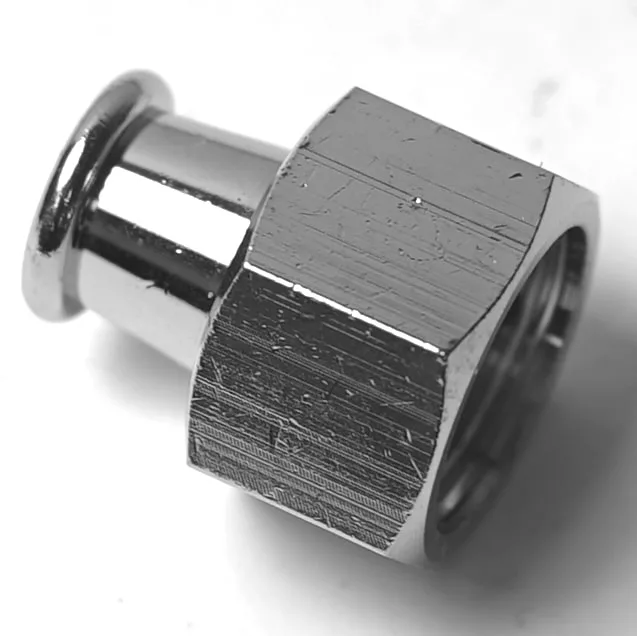 A close-up of the Ascaso F..363 1-CUP STRAIGHT SHORT PORTAFILTER SPOUT shows its shiny metal finish, rounded cap, and visible texture with some surface scratches, photographed on a white background. © 2025 1st-line.com