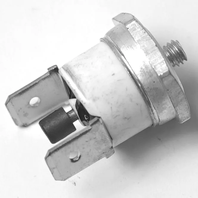 A close-up of the ECM C199901550.1 Safety Thermostat 145°C, featuring a metal casing, two flat terminals, and a threaded mounting post, shown against a white background. © 2025 1st-line.com