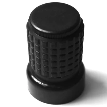 A close-up photo of the DISCONTINUED F..484 WATER PIPE, a black, textured plastic cylindrical object with a ridged grip and flat top, shown on a white background. © 2025 1st-line.com