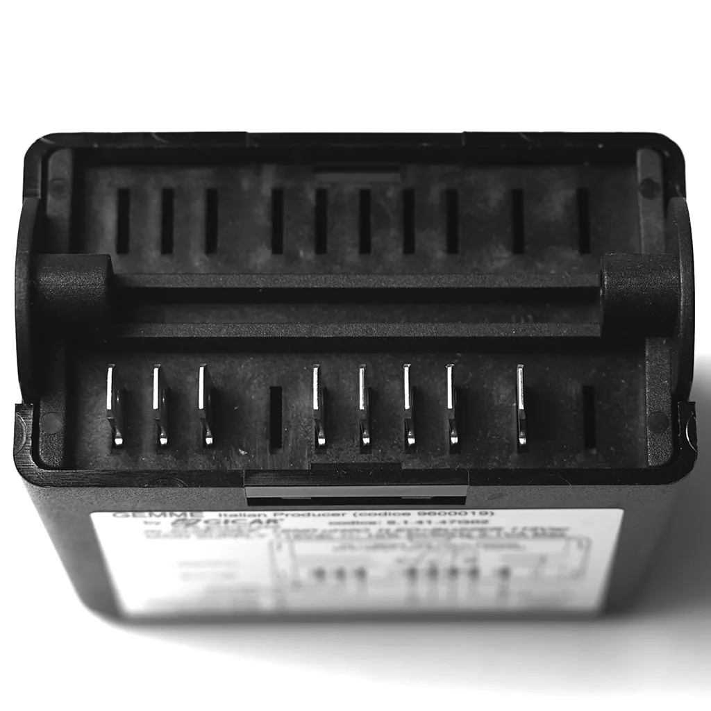 A close-up, top-down view of a black electronic adapter from the discontinued Gicar 9600046 Brain Unit (9.3.01.09G01) for the Lelit Bianca PL162T, showing multiple metal pins, slots, and a partially visible white label on the side. © 2025 1st-line.com