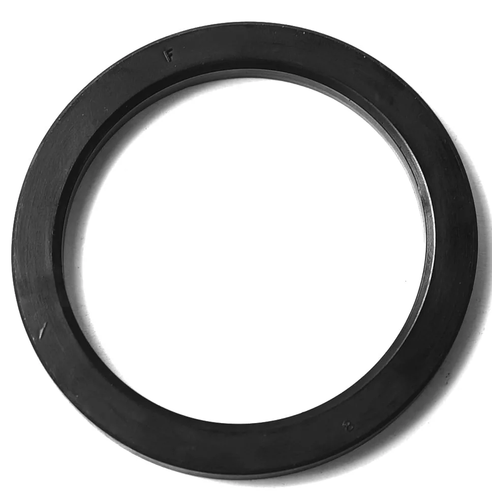 A CON.72 PORTAFILTER GASKET, a black, circular metal washer with a smooth surface and hollow center for espresso machines, shown on a white background. © 2025 1st-line.com