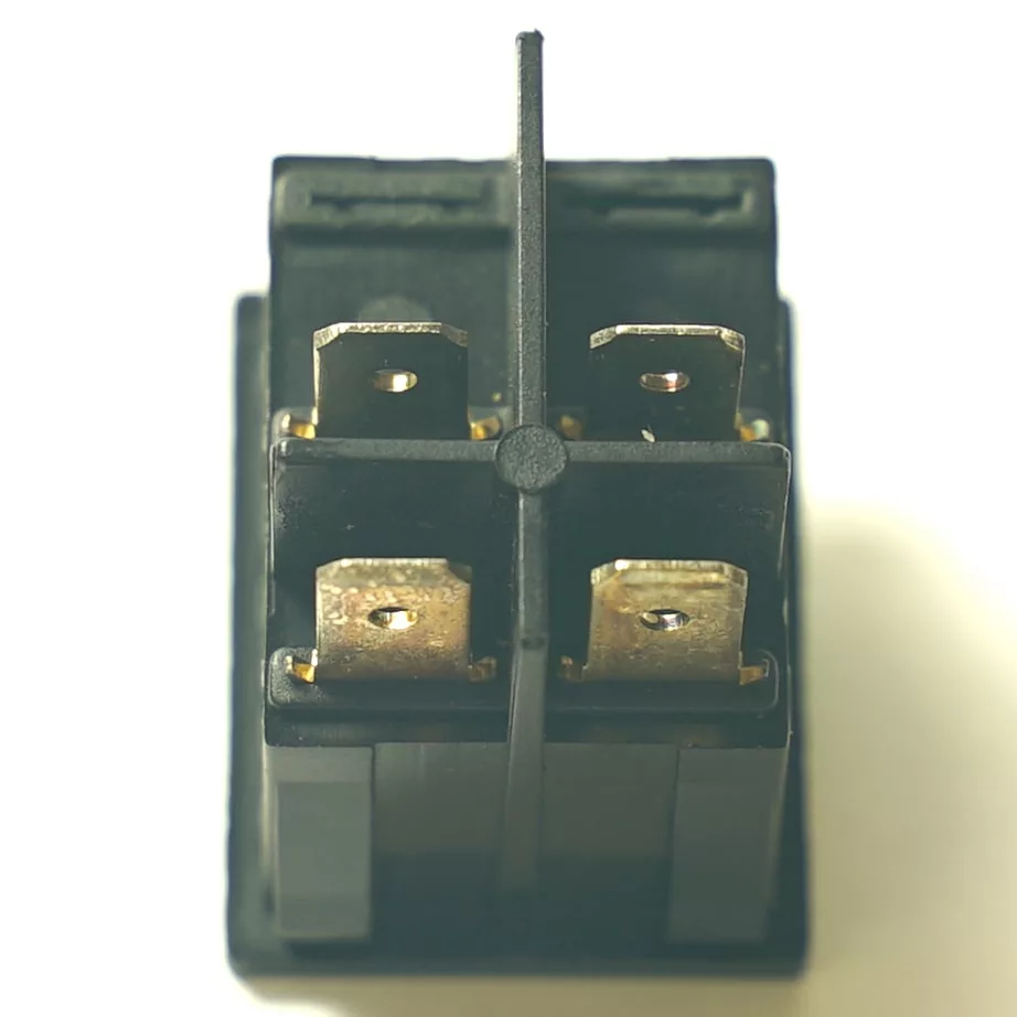 Close-up of a DH.318 GREEN BIPOLAR SWITCH 250V 16A, featuring four metal terminals and a central plastic divider against a white background. Suitable for use in electrical relay applications. © 2025 1st-line.com