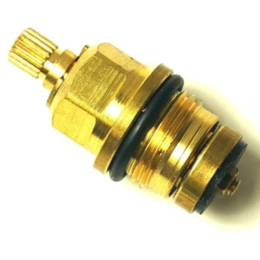 Close-up of a FE..66 TAP MECHANISM brass valve cartridge with black rubber O-rings, grooved threads, and a ridged stem, isolated on a white background. © 2025 1st-line.com