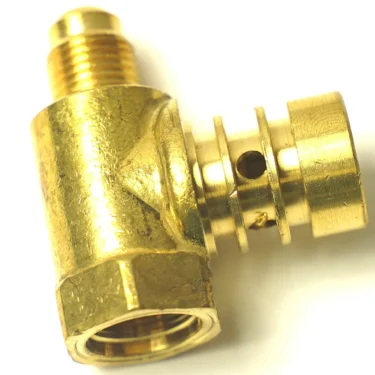 Close-up of a Futurmat TAP BODY brass right-angle pipe fitting featuring threaded ends and a small side hole, displayed against a white background. © 2025 1st-line.com