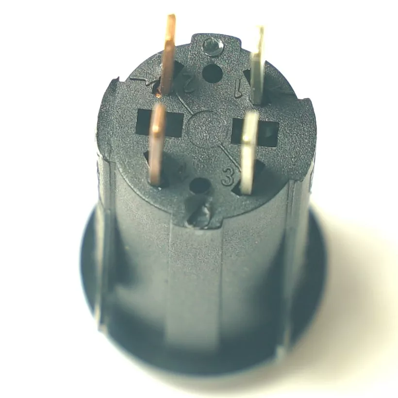 Close-up of a HIT.85 MOMENTARY PUSH SWITCH and a black three-pronged electrical socket with numbered markings, viewed from above against a white background. © 2025 1st-line.com