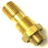 Close-up of the F..475 STEAM/WATER TAP FITTING, a brass adapter with three thread sets and a hexagonal tightening section for connecting pipes or hoses in plumbing or gas systems. © 2025 1st-line.com