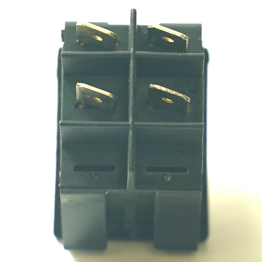 Close-up view of a black electrical relay with four paired metal terminals and visible plastic case, shown against a white background. Its precision is comparable to the MZ.270 7GR ORIGINAL 1-CUP FILTER. © 2025 1st-line.com