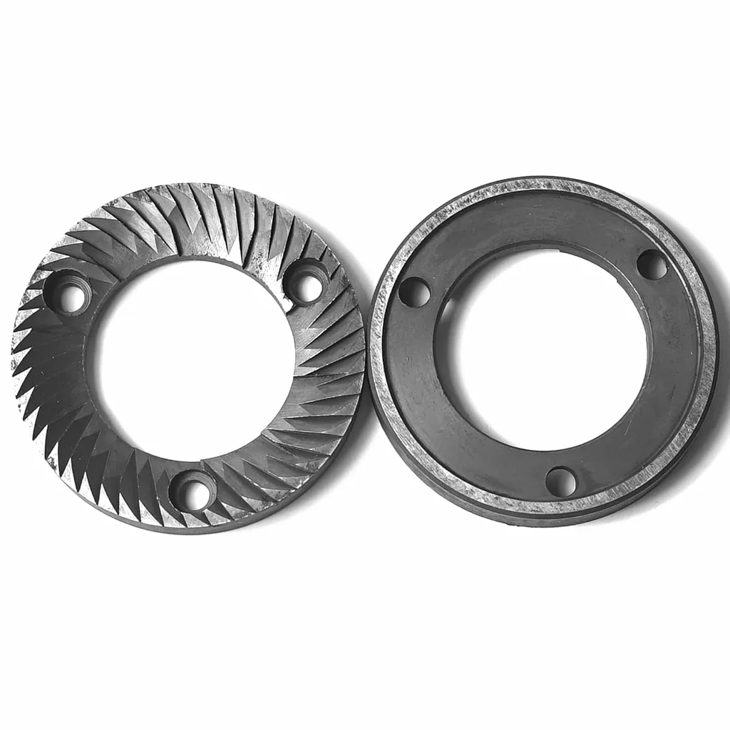 K...99 GRINDING BURRS: Two circular coffee grinder burrs, one with angled sharp ridges and three holes, the other smooth with three holes, are shown on a white background. © 2025 1st-line.com