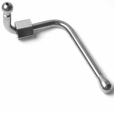 The 1st-line Cool Touch Stainless Steel Steam Wand is a metal L-shaped crank handle with a rounded end and rotating joint, shown on a white background. © 2025 1st-line.com