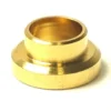 The 1st-line Tap Joint Spring Guide is a small, round brass bushing with a flanged base and cylindrical center, commonly used as a spring guide. It is displayed on a white background. © 2025 1st-line.com
