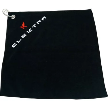 The Elektra 06385035 Microfiber Cloth is black and rectangular with a silver grommet in the top left corner. ELEKTRA in white and a small red logo are printed diagonally near the top left edge. © 2025 1st-line.com