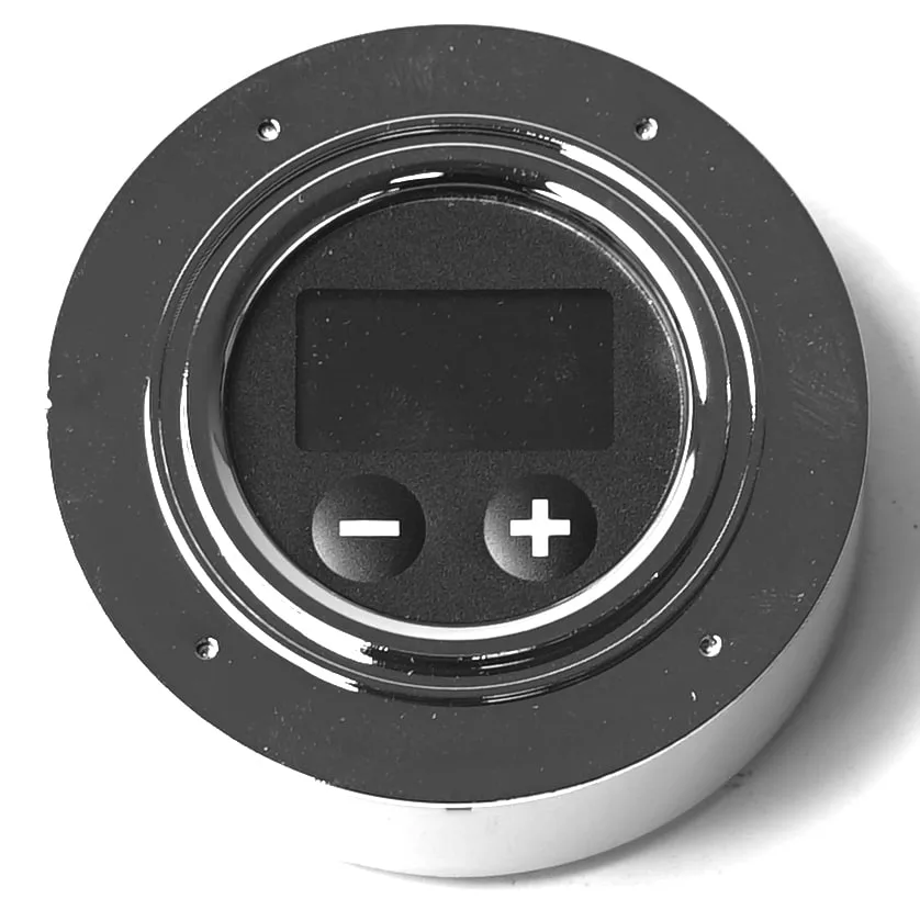 The Lelit 9600071 Kate LCC Display (Cod 9.3.01.22G01) is a round electronic control panel featuring a compact display, two large plus and minus buttons, all set in a shiny metallic frame against a white background. © 2025 1st-line.com