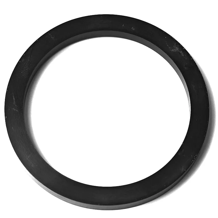 The M...24 PORTAFILTER GASKET 65x53x5.3mm is a black, flat, circular rubber gasket with a hollow center, shown on a white background. © 2025 1st-line.com